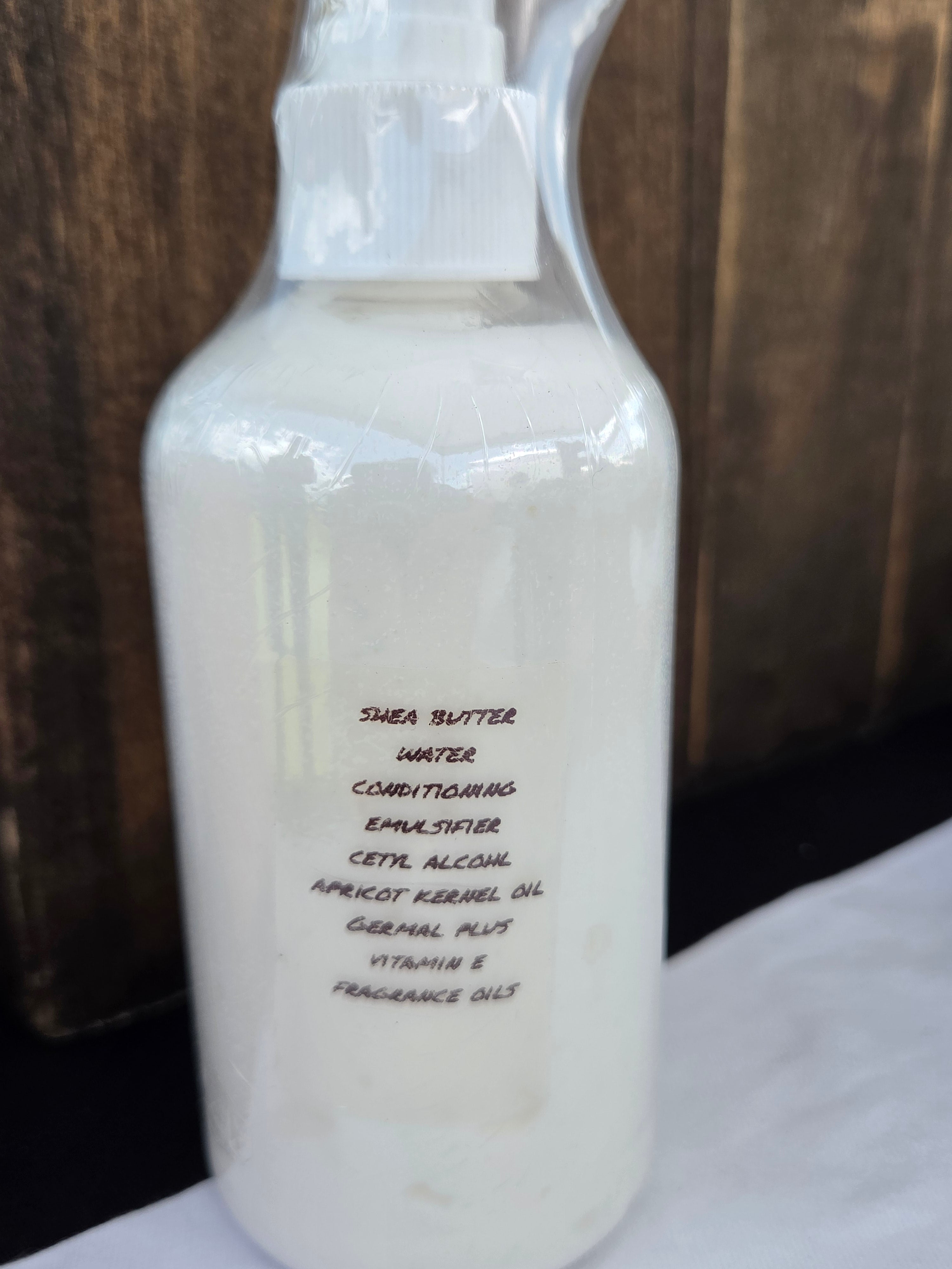 SMOKED TONKA + OUD LOTION