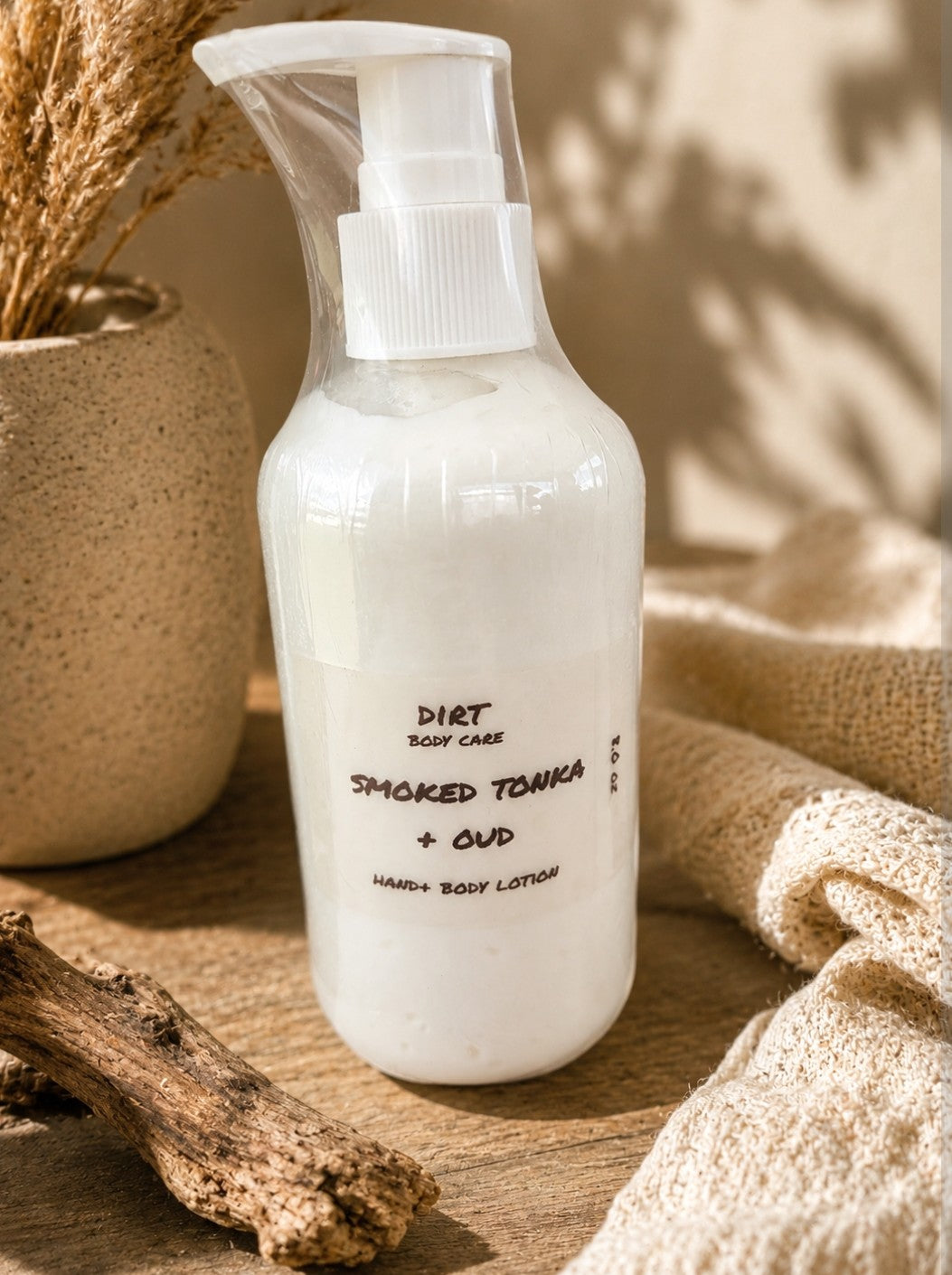 SMOKED TONKA + OUD LOTION